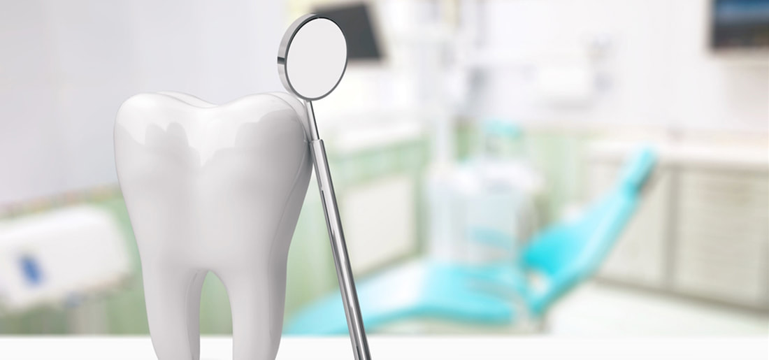 Dentist North Brisbane - tooth with dental in a clinic.