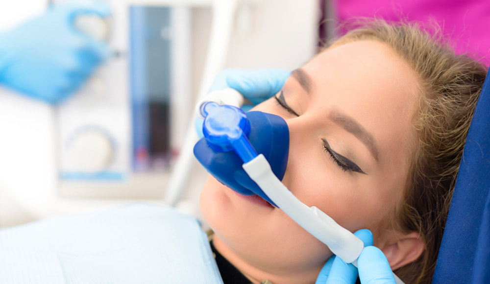 Inhalation Sedation to treat for severe anxiety and fear before a dental treatment.